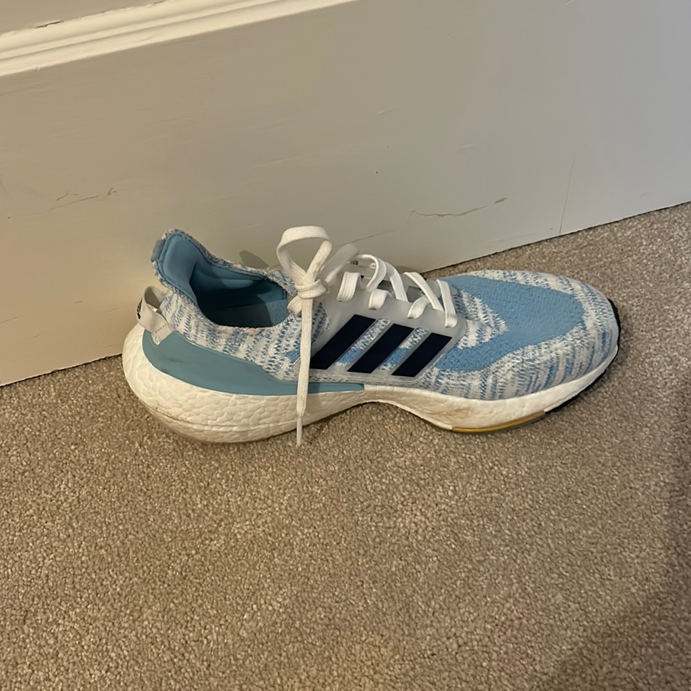 Gently used adidas blue and black in a size 71/2